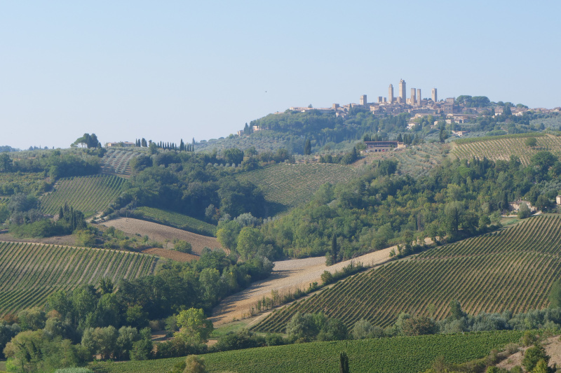 The beautiful Tuscan countryside, with rolling hills and small villages