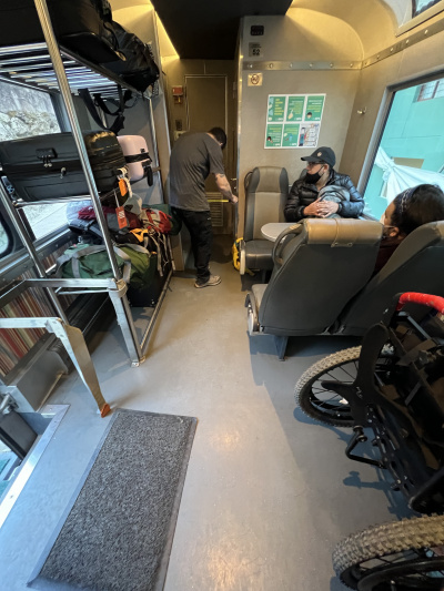 There is a seating area where wheelchair users can travel