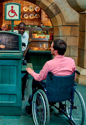 A wheelchair user explores Disneyland Paris