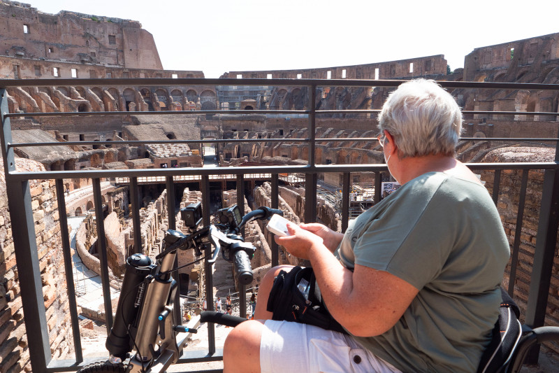 A wheelchair user explores the Colosseum