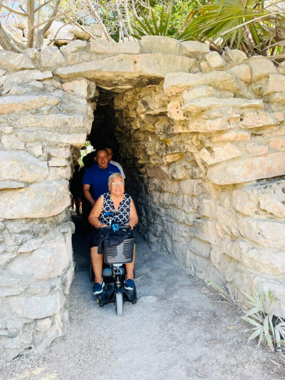 A wheelchair user explores Chichen Itza