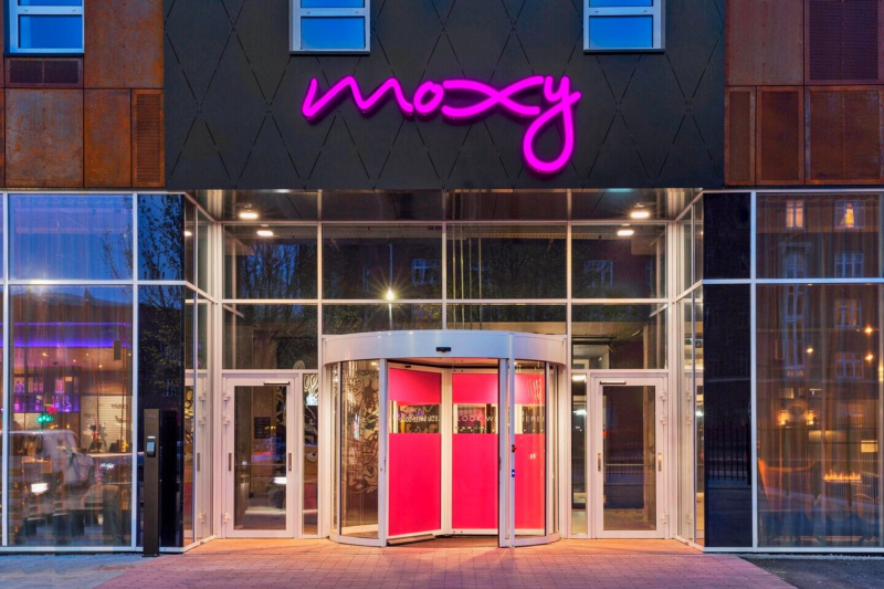 Moxy hotel entrance with step free doorwarys and rotating door