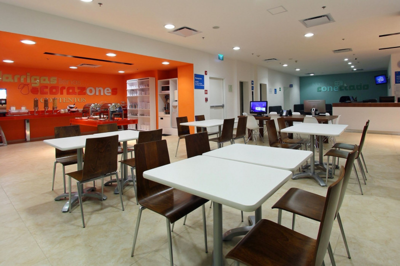 Dining area with tables at an accessible height and buffet area