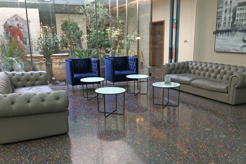 The spacious seating are has assorted sofas, armchairs, and low tables.