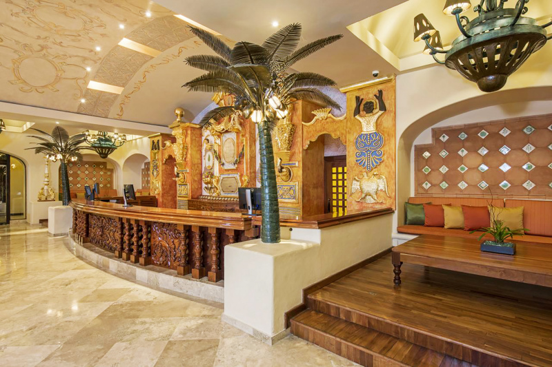 Detailed front desk made from wood and mediterranean theme