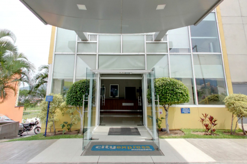 Front entrance with step free entryway and double doors.