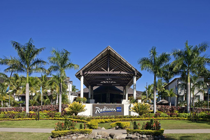 Radisson Blue Resort with ocean views and tropical foliage