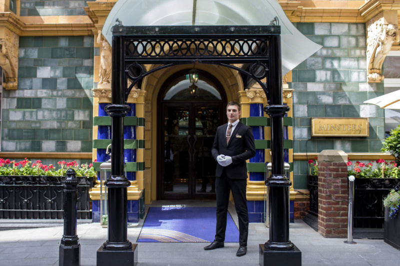 Hotel attendant at entrance
