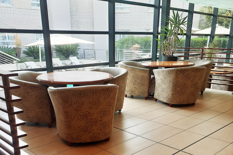 Lobby lounge seating and table at an accessible height