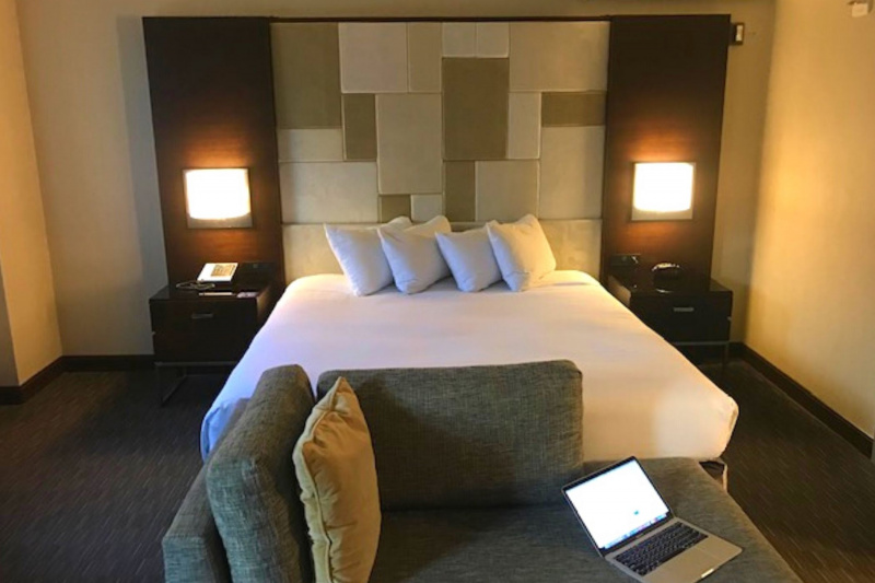 King-size bed with 2 nightstands and a sofa