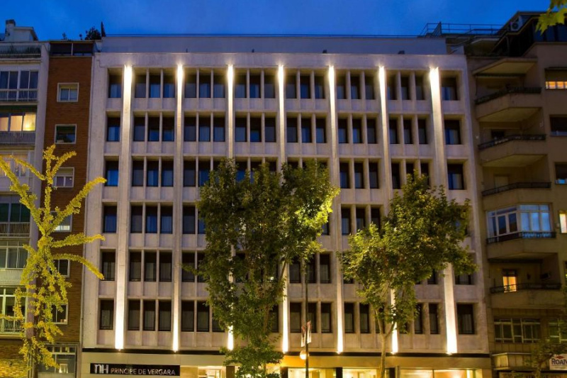Hotel facade by night.