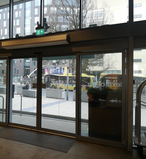 Main entrance with automatic glass doors.