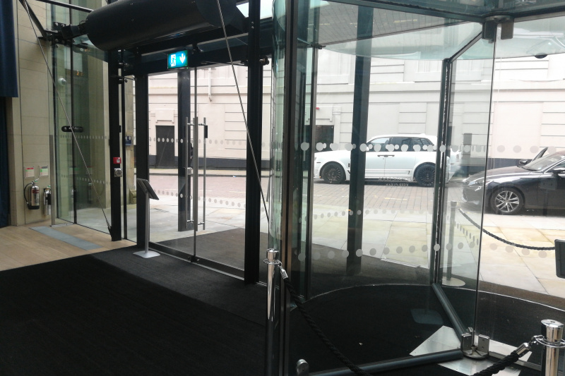 Stepfree entrance with revolving doors