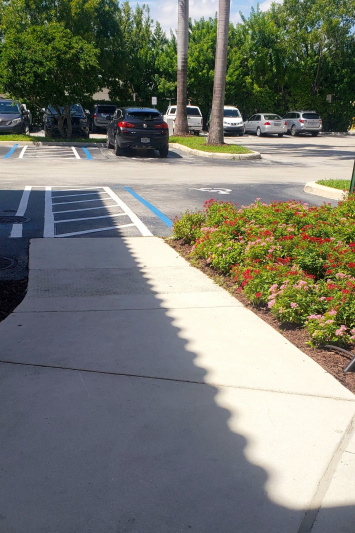 The ramp from the accessible parking spaces to the hotel entrance