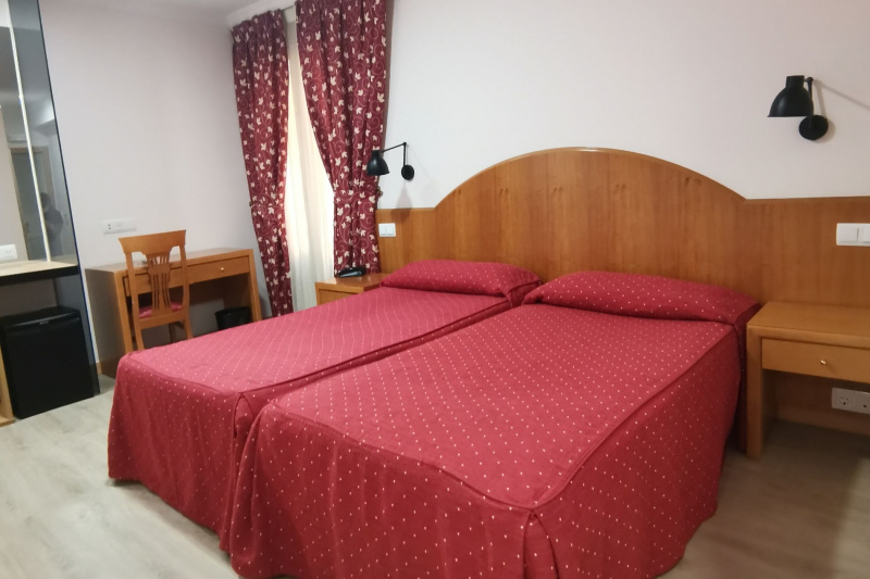 Room 108 features 2 single beds