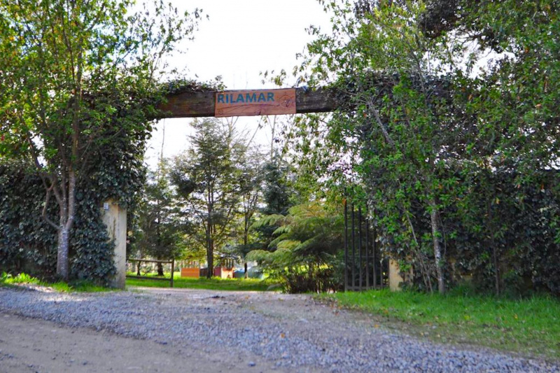 Property entrance with gravel road