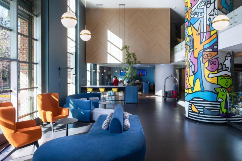 Lobby seating area with modern art and furniture
