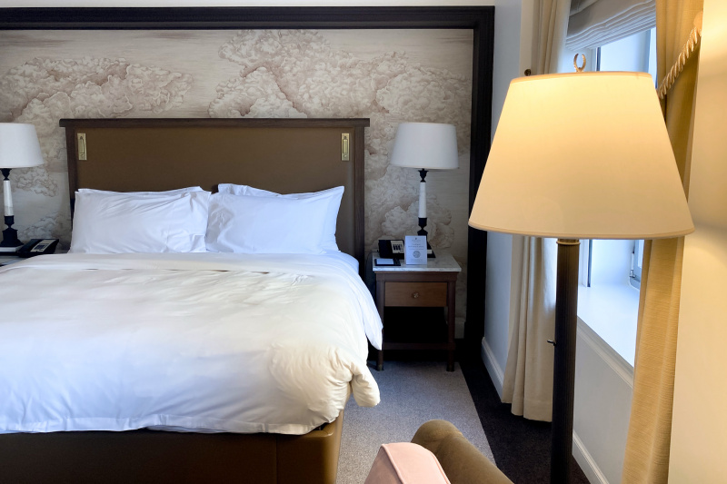 Guestroom with bed and nightstand