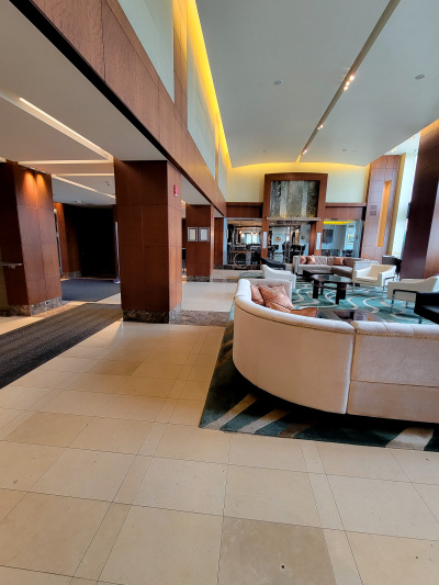 Lobby area with marble floors and seating area