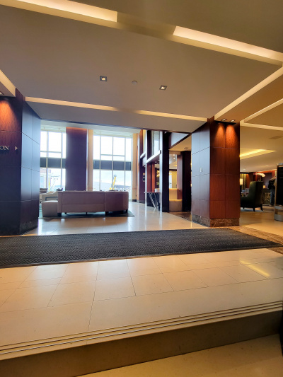 Lobby area with marble floors and seating area