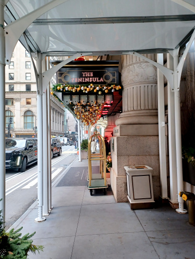 Hotel entrance viewed from the sidewalk