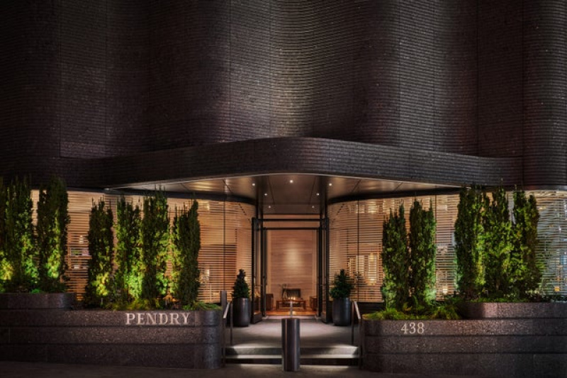 Hotel entrance with 2 steps and handrails