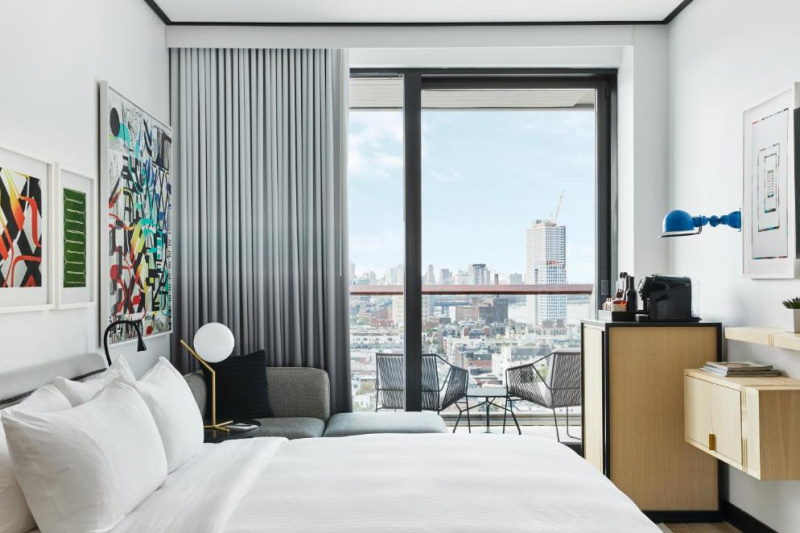 Guestroom with balcony and modern decor