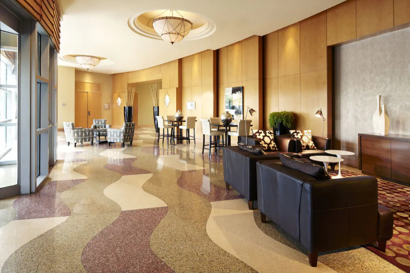 Lobby area with tiled floor and seating areas