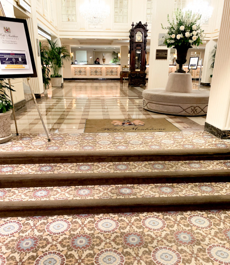 Lobby accessed by three carpeted steps