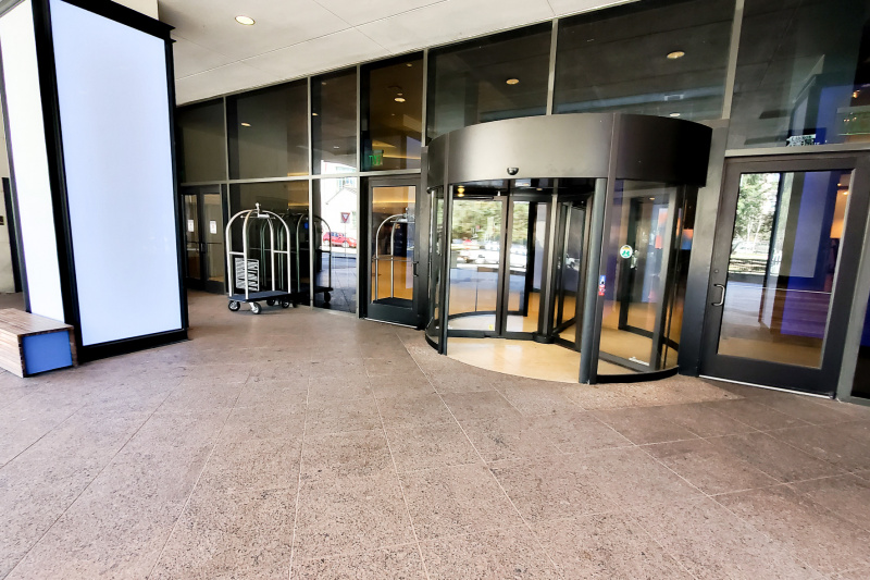 Hotel entrance with revolving and accessible doors