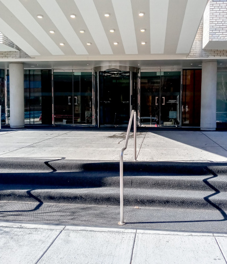 Steps leading to the hotel's entrance