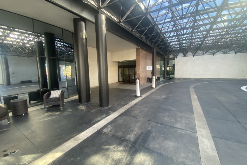 Covered hotel entrance with automatic doors
