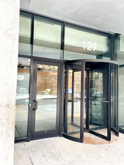 Entrance with revolving and automatic door