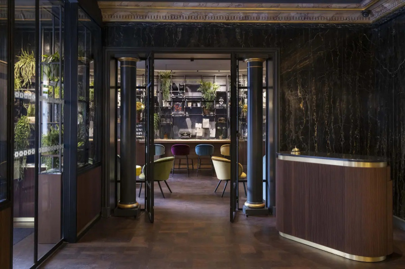 Lobby with parquet floor and marble decor
