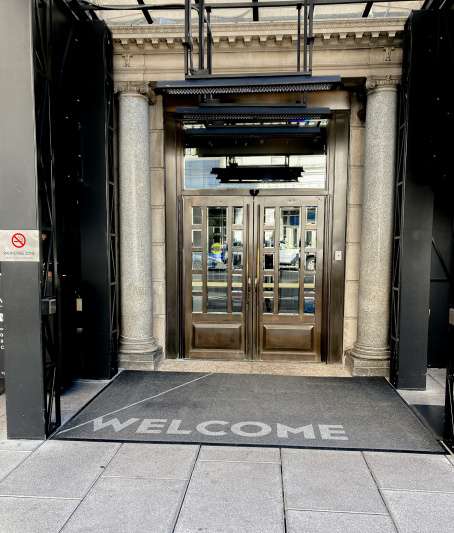 Covered hotel entrance with double doors