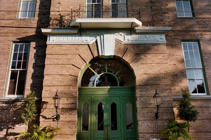 Hotel building and entrance accessed by one step