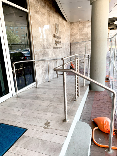 Hotel entrance access ramp and steps