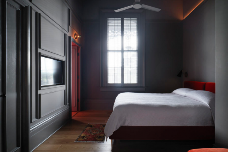 Guestroom with modern decor and wooden flooring
