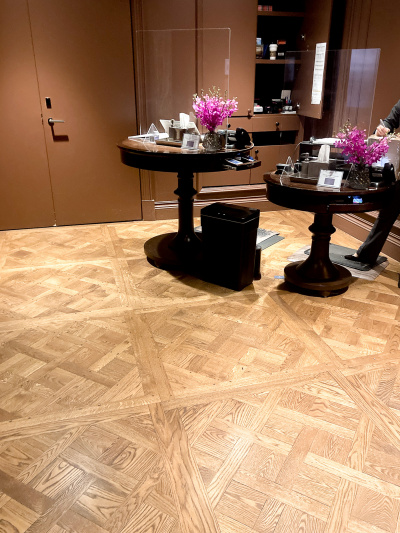 Front desk area with parquet flooring