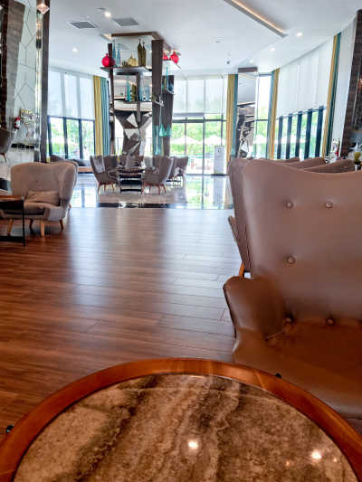 Lobby seating area with wooden flooring