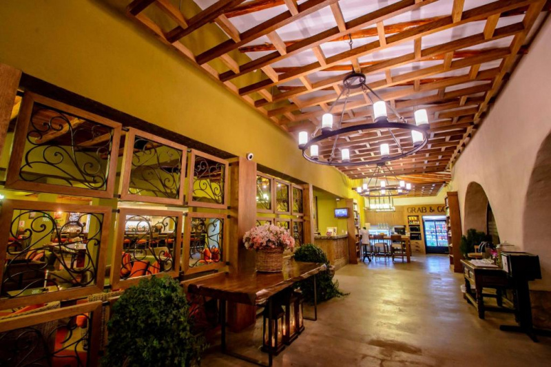The hotel lobby is clear and spacious with step-free access to the reception desk.