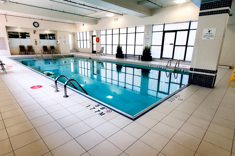There are shallow steps with a handrail to access the indoor pool.
