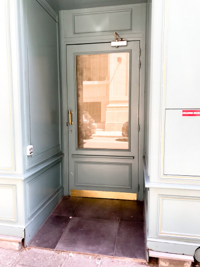 The accessible hotel entrance has a wide door.