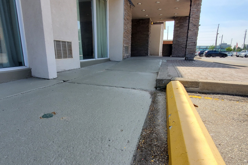Exterior of the hotel showing step-free route to the car park.