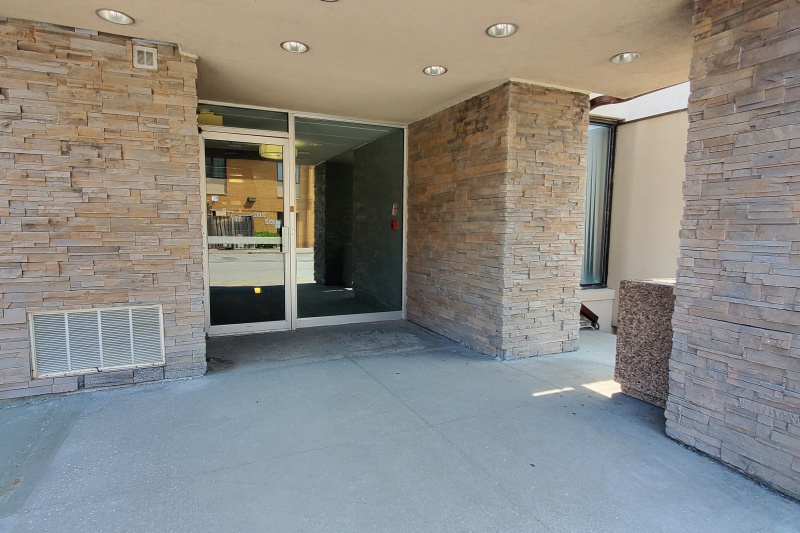 Exterior view showing step-free access to a side door.