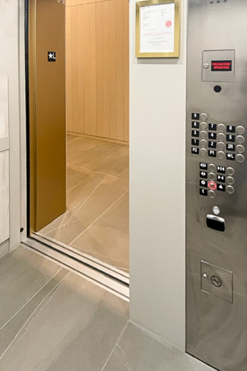 There is step-free access to the elevator which has buttons with big numbers.