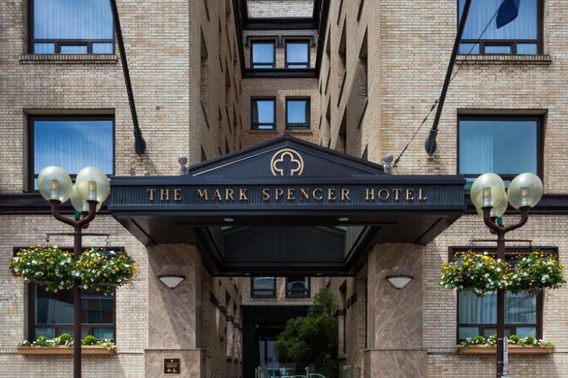 The exterior of the hotel has 3 small steps leading up to the main entrance.