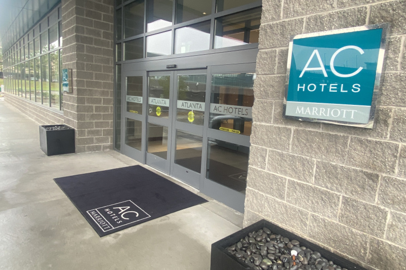 The hotel entrance has step-free access through automatic sliding doors.