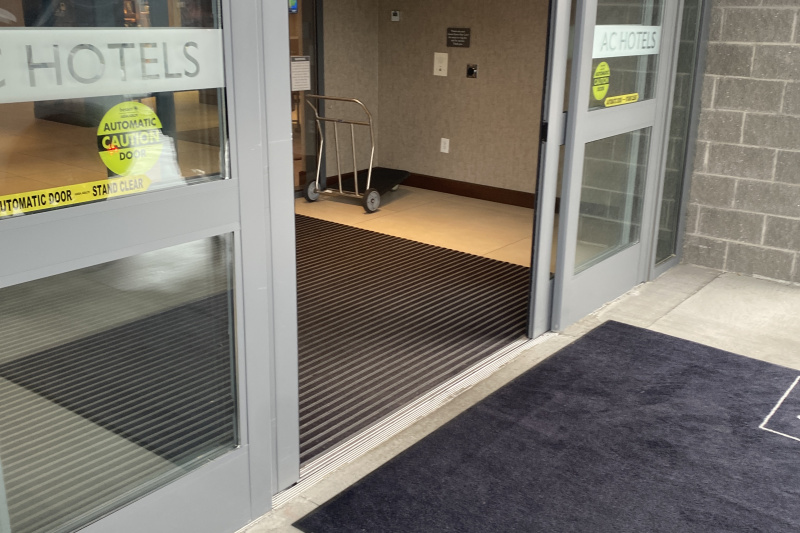 The hotel entrance has step-free access through automatic sliding doors.