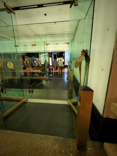 This entrance is step-free. There are two sets of double width glass doors, leading into a sizeable hall.